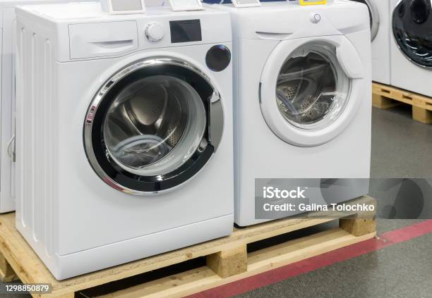 Washing Machines Stock Photo - Download Image Now - Machinery, Buying, Laundromat