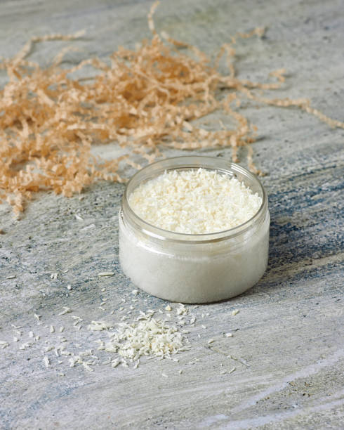 istock A plastic jar with a cleansing scrub based on coconut flakes 1298858878