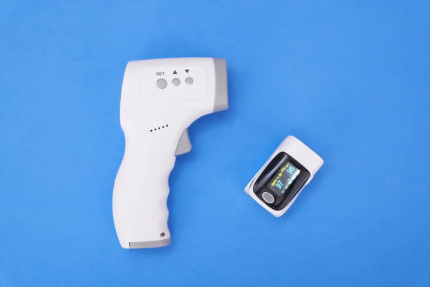 istock Digital thermometer in knob on blue background 1298859706