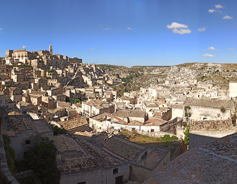 Stunning view of the village of Matera during a beautiful sunny day. Matera is a city on a rocky outcrop in the region of Basilicata, in southern Italy.