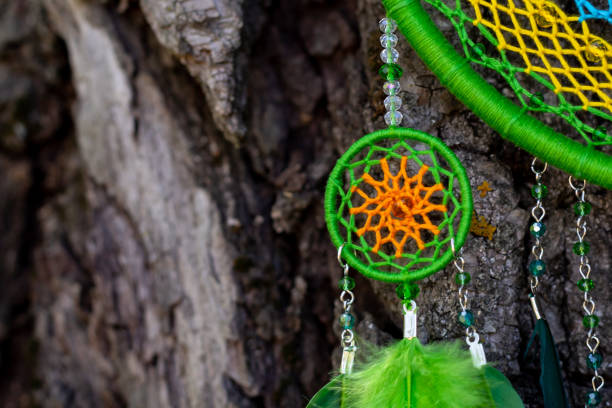 istock Handmade dream catcher with feathers threads and beads rope hanging 1298862069