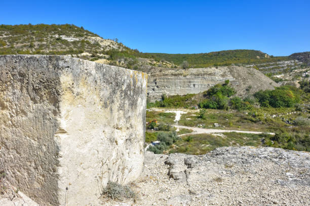 istock Big stone blocks. Abandoned quarry. stones in an abandoned quarry 1298862971