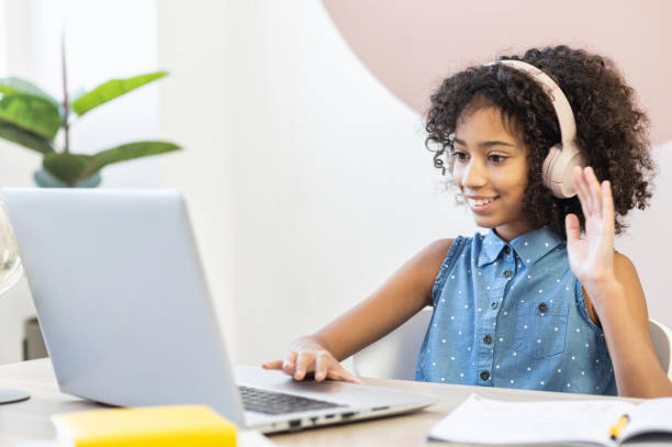 istock An African schoolgirl is learning online 1298863899