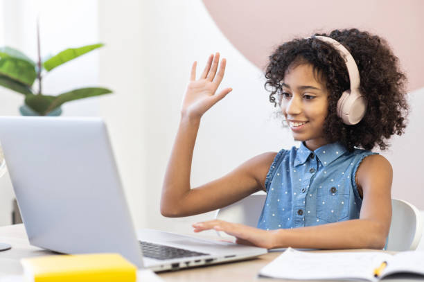 istock An African schoolgirl is learning online 1298863917