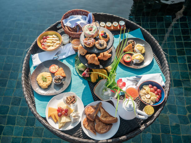 istock Floating breakfast on infinity pool in luxury hotel 1298864711