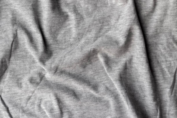 istock Cotton jersey fabric texture. Crumpled gray textile background 1298878360