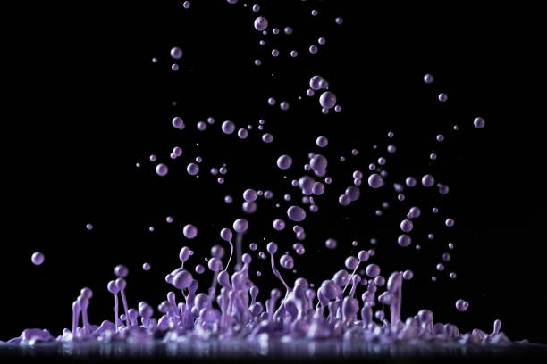 istock dancing purple color liquid with sound drive 1298879156