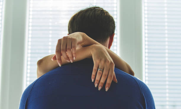 istock Flirtatious couple in romantic embrace 1298883687