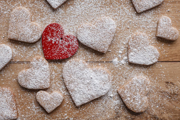 istock Decorative red heart surrounded with heart shaped sugar cookies 1298884503