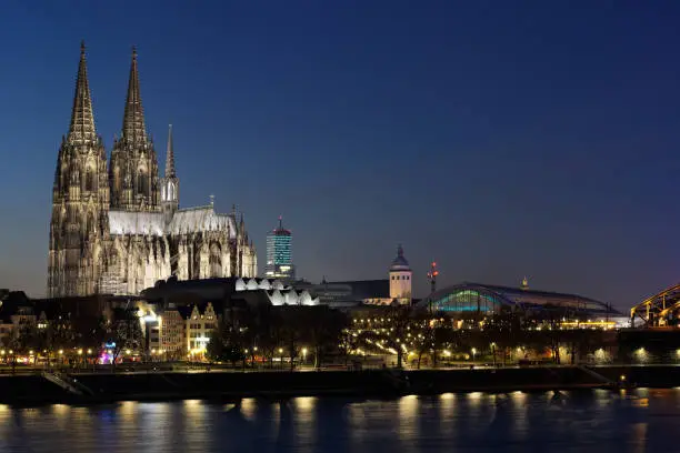 cityview cologne with cathedral and central station at dusk