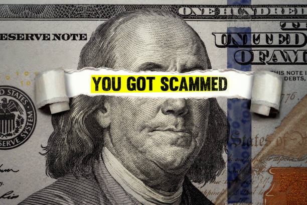 istock Bill torn revealing words You got Scammed 1298889333