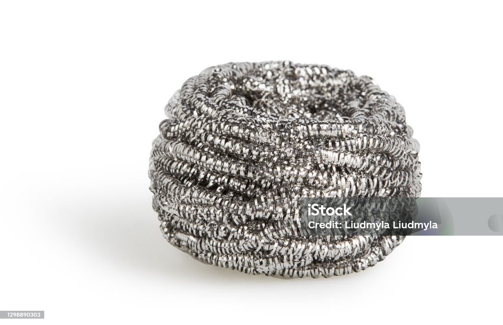 Stainless steel scrubber isolated on white background with clipping path Stainless steel scrubber, scouring pad (metal sponge, scrub bud) for dish washing isolated on white background with clipping path Scouring Pad Stock Photo
