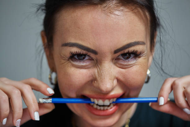 istock Image of screaming agressive young woman. 1298904213