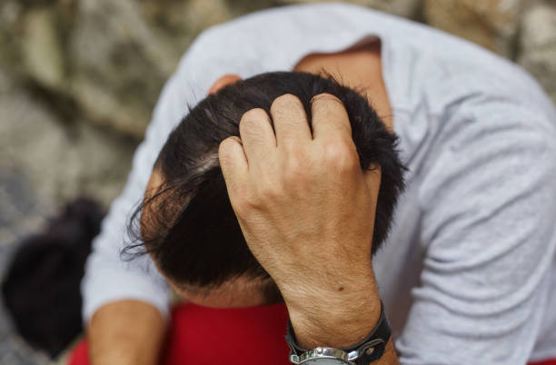 istock Close-up of a sad and depressed man 1298904246