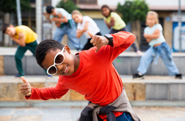 istock Boy hip hop dancer exercising outdoors 1298904632