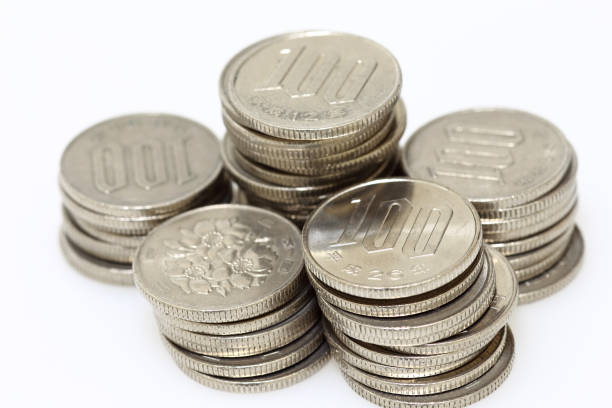istock Pile of hundred yen coins 1298905478