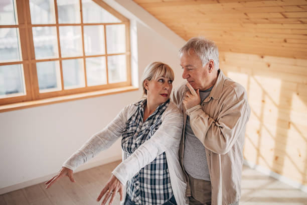 istock Senior couple in their empty new home 1298911153