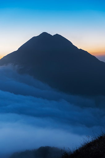Mountain Fung Wong Shan - Lantau Peak at dusk. Natural landmark in hong kong
