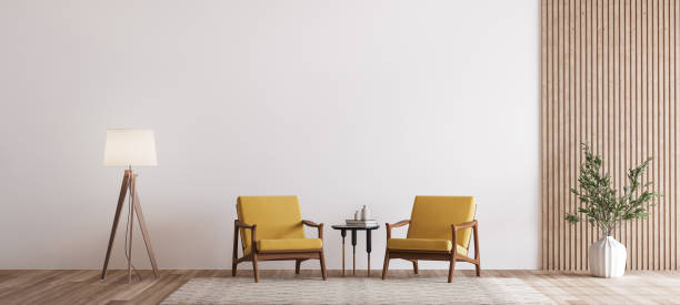istock Living room design with empty wall mockup, two wooden chairs on white wall, copy space 1298922800