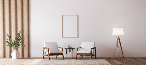 Living room design with empty frame mockup, two wooden chairs on white wall stock photo