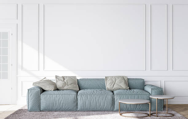 istock Blue sofa in contemporary living room, minimal design with empty white wall 1298923072