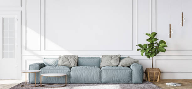 istock Blue sofa in contemporary living room, minimal design with empty white wall 1298923076