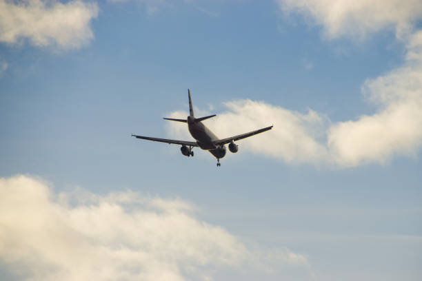 Airplane silhouette in the sky
