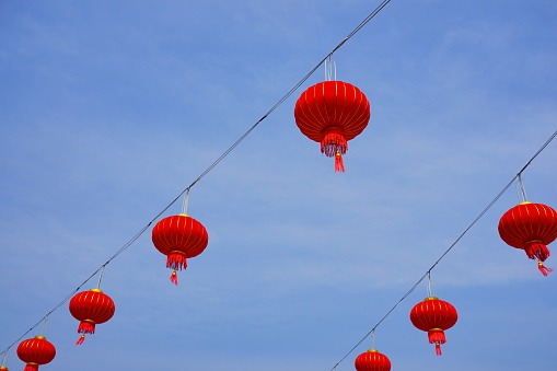 Chinese lanterns on sky background