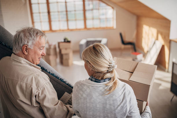 istock Senior couple moving their stuff in new apartment 1298932112