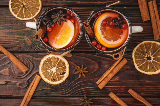 istock Christmas composition with hot mulled wine in rustic cup 1298932751