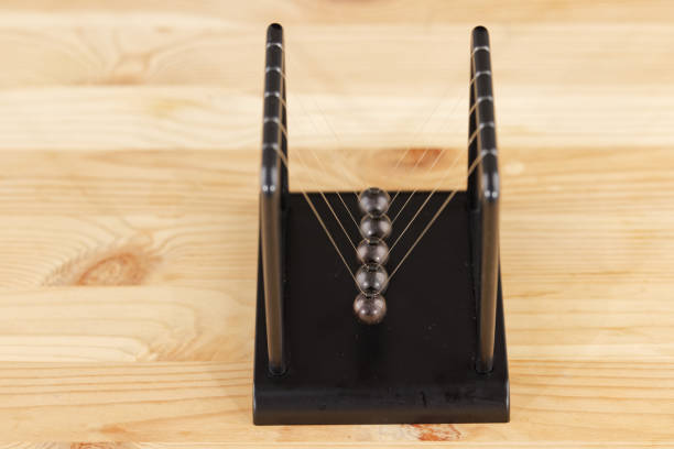 istock Newton cradle balance balls on the table 1298936335