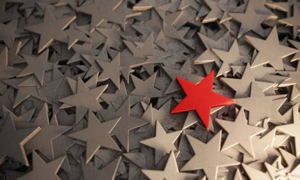 istock Red Star Standing Out From The Crowd 1298937195