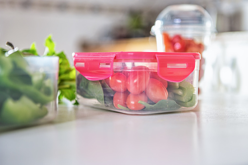 A plastic containers with mixed sliced vegetables to take away