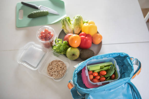 istock Vegan snacks in a plastic box for the picnic 1298940023