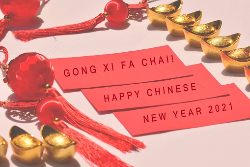 Text label with blurred background of Chinese New Year decoration, Happy Chinese New Year 2021.