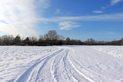 A beautiful view of a snow-covered farmland