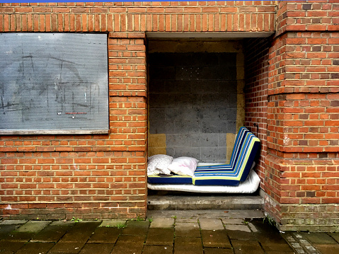 Old Mattresses Piled up the Doorway of an Abandoned Building by a Rough Sleeper