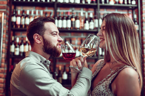 istock Couple Enjoying Romance And Wine Together 1298948066