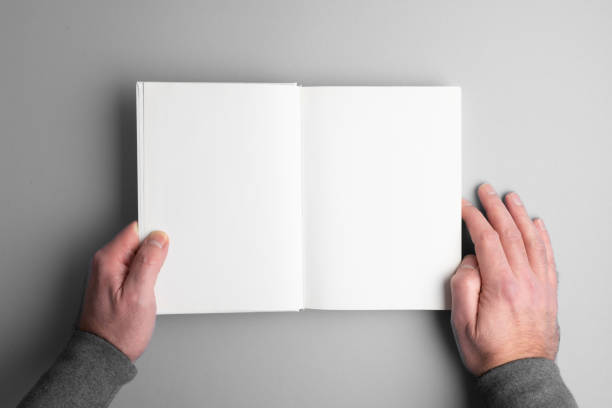 istock person opening blank page hardcover book 1298952839