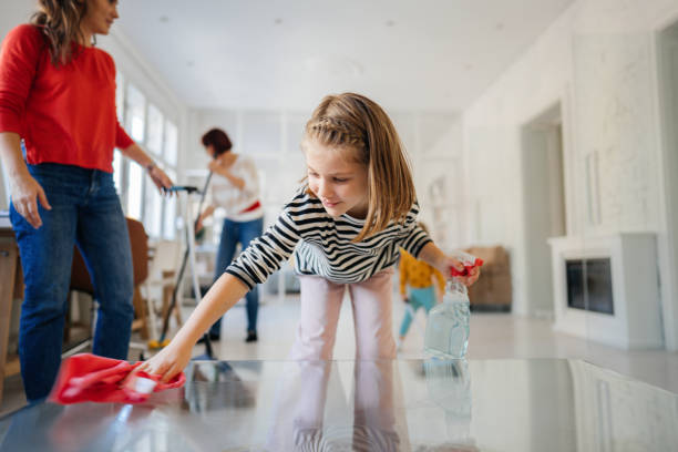 istock Cleaning our home together 1298954421
