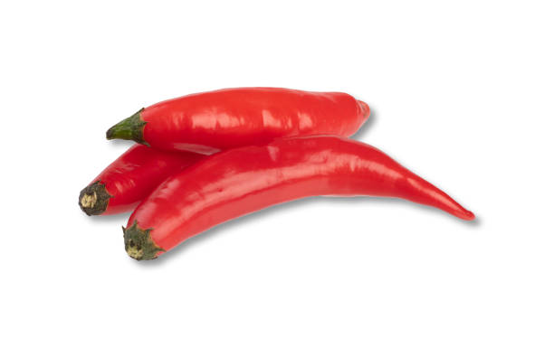 istock Group of red chili peppers isolated over white background 1298955515