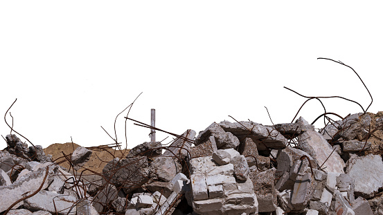 Concrete remains of a ruined building with exposed rebar, isolated on a white background. Background