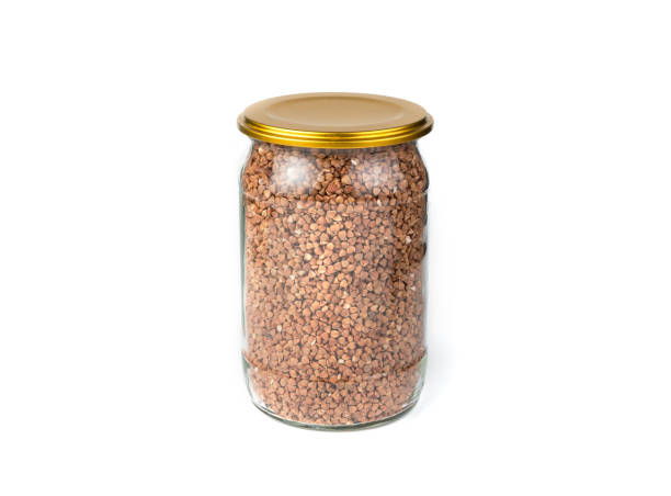 istock Bank with buckwheat on a white background 1298955903