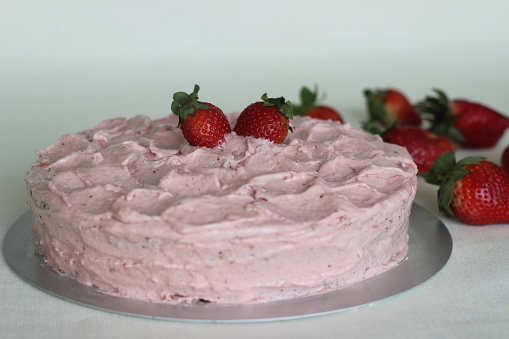 Strawberry cake with strawberry cream cheese frosting. A treat for valentines day and birth day celebrations