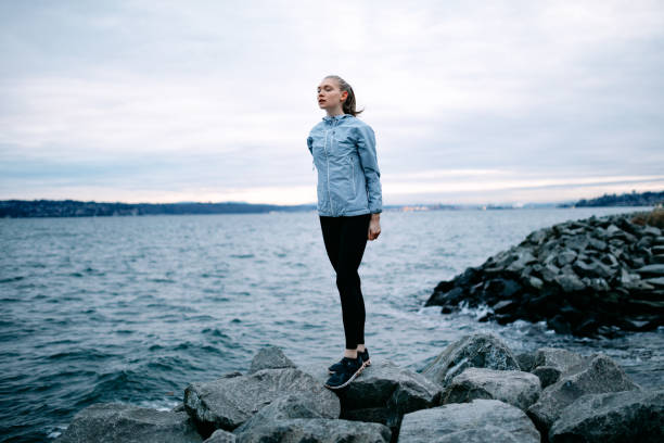 istock Morning Runner Takes a Break at Waterfront Trail 1298966153