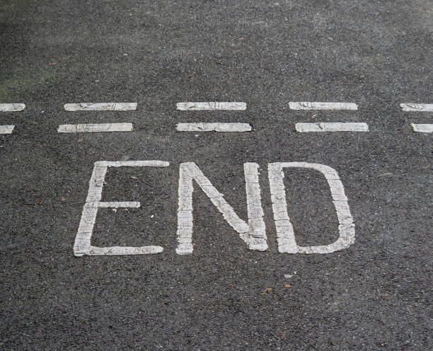 istock End road marking. Concept Covid, coronavirus, restrictions, teirs etc. UK. 1298969432