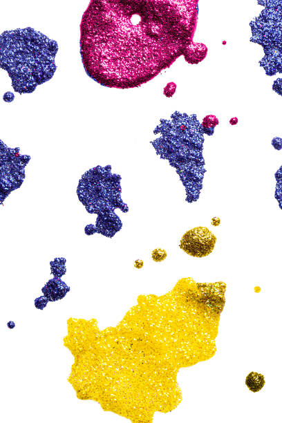 istock Colorful glitter drops on white background, closeup 1298973711