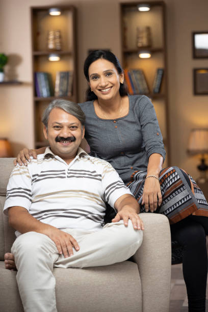 istock Couple at home - stock photo 1298979652