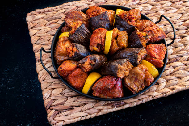 dried eggplant stuffed with rice, tomato and olive oil known as dolma. - dolmades imagens e fotografias de stock