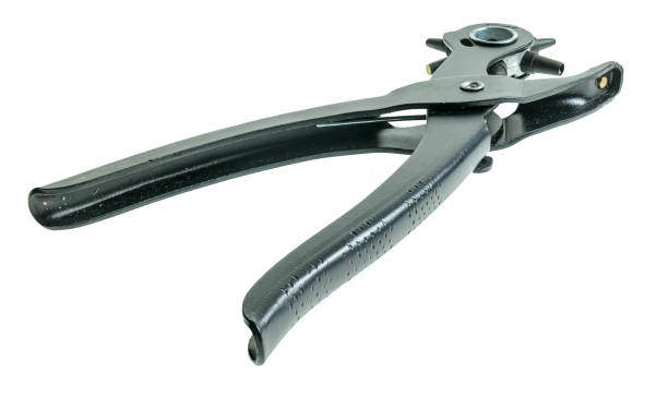 istock Dress making hole punch on a white background 1298983756